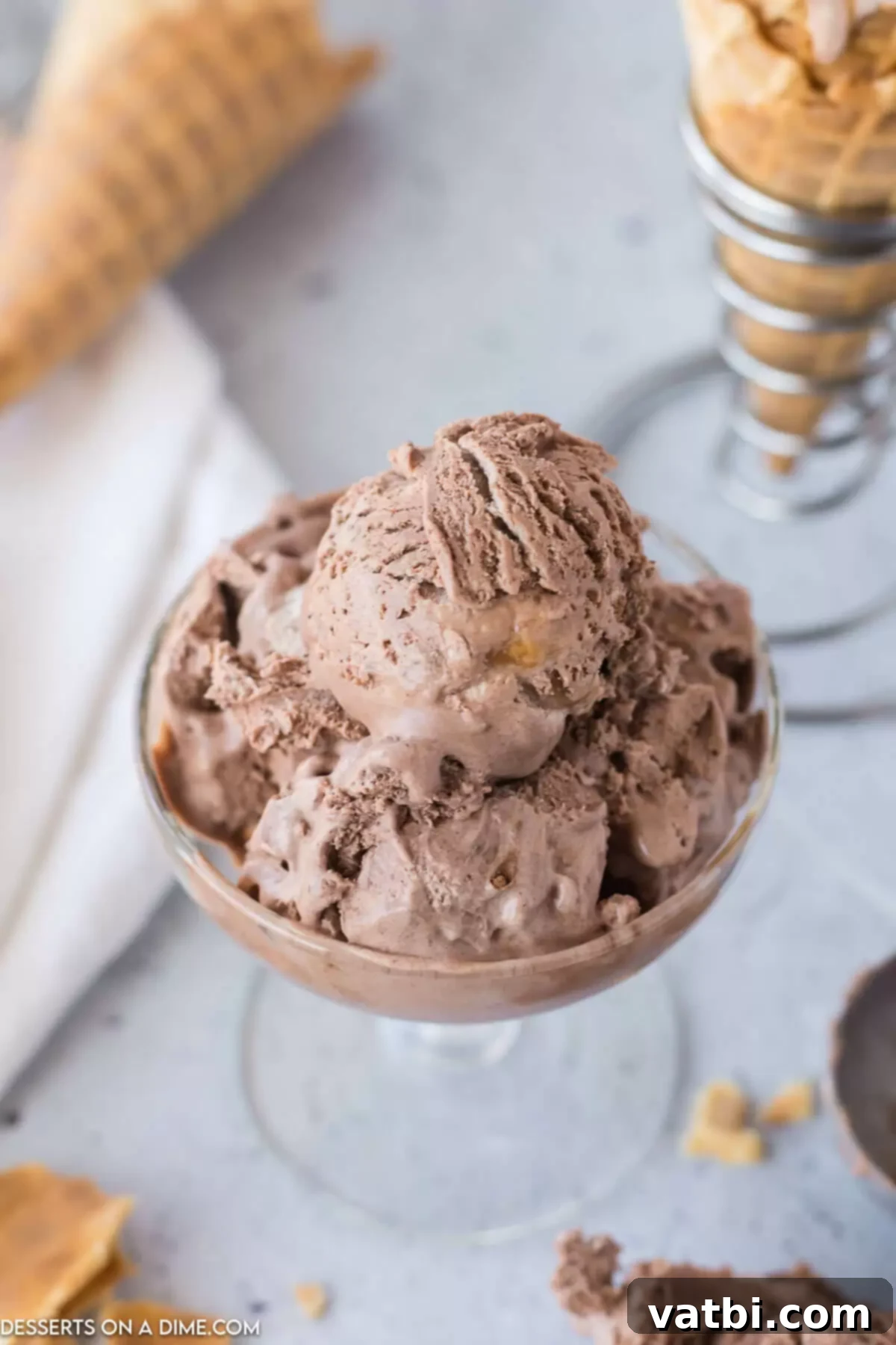 Scoops of chocolate caramel ice cream in a bowl