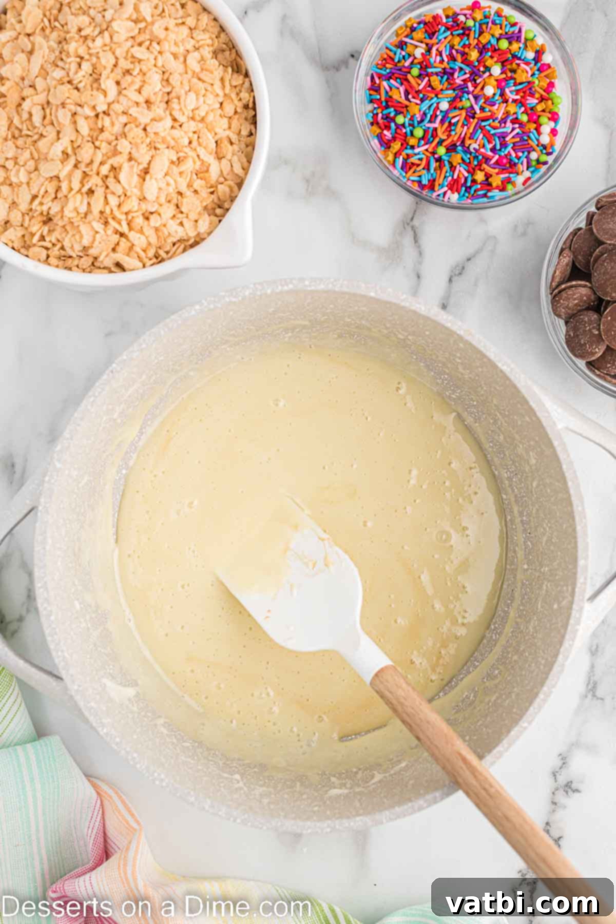 No-Bake Chocolate Crispy Treats 4 Melted butter and marshmallows combined in a bowl.