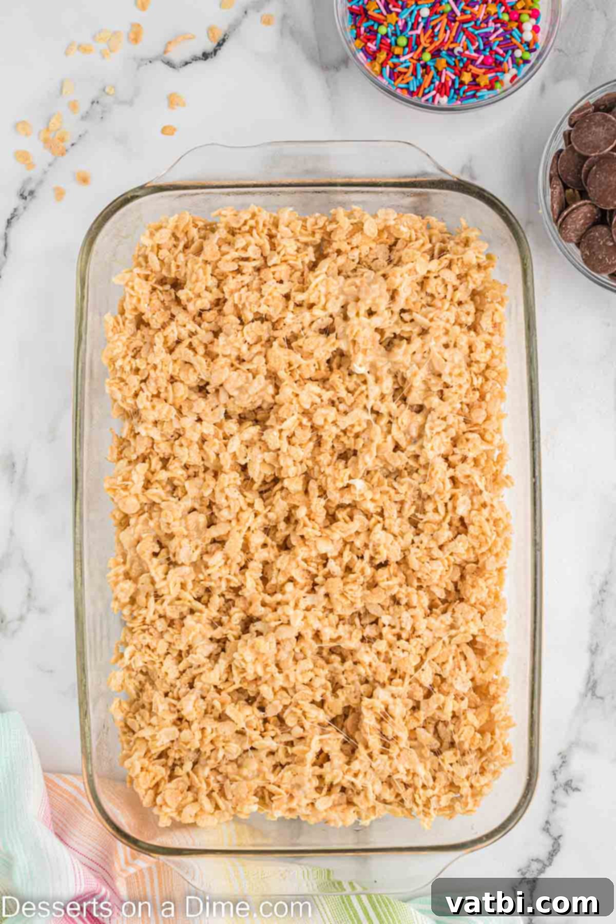 No-Bake Chocolate Crispy Treats 5 Cereal mixture pressed into baking dish.