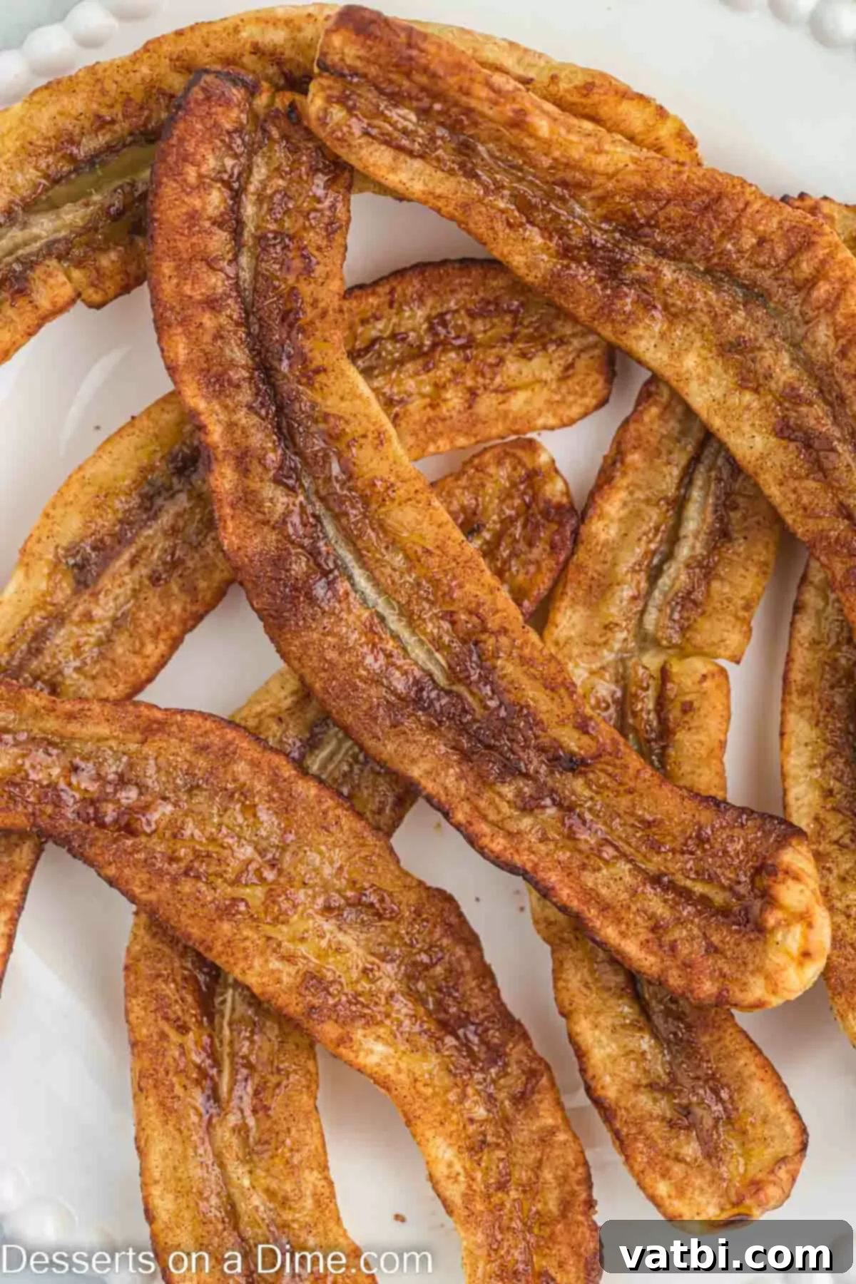 Easy Air Fryer Bananas 4 Air Fryer bananas on a plate