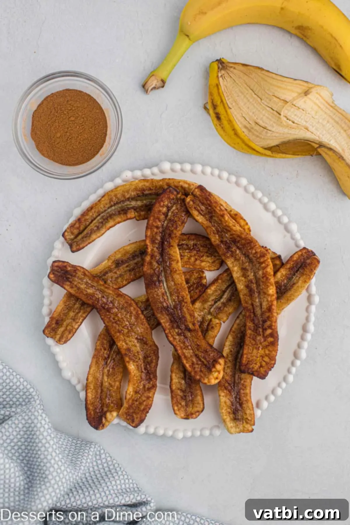 Easy Air Fryer Bananas 7 Bananas on a platter.