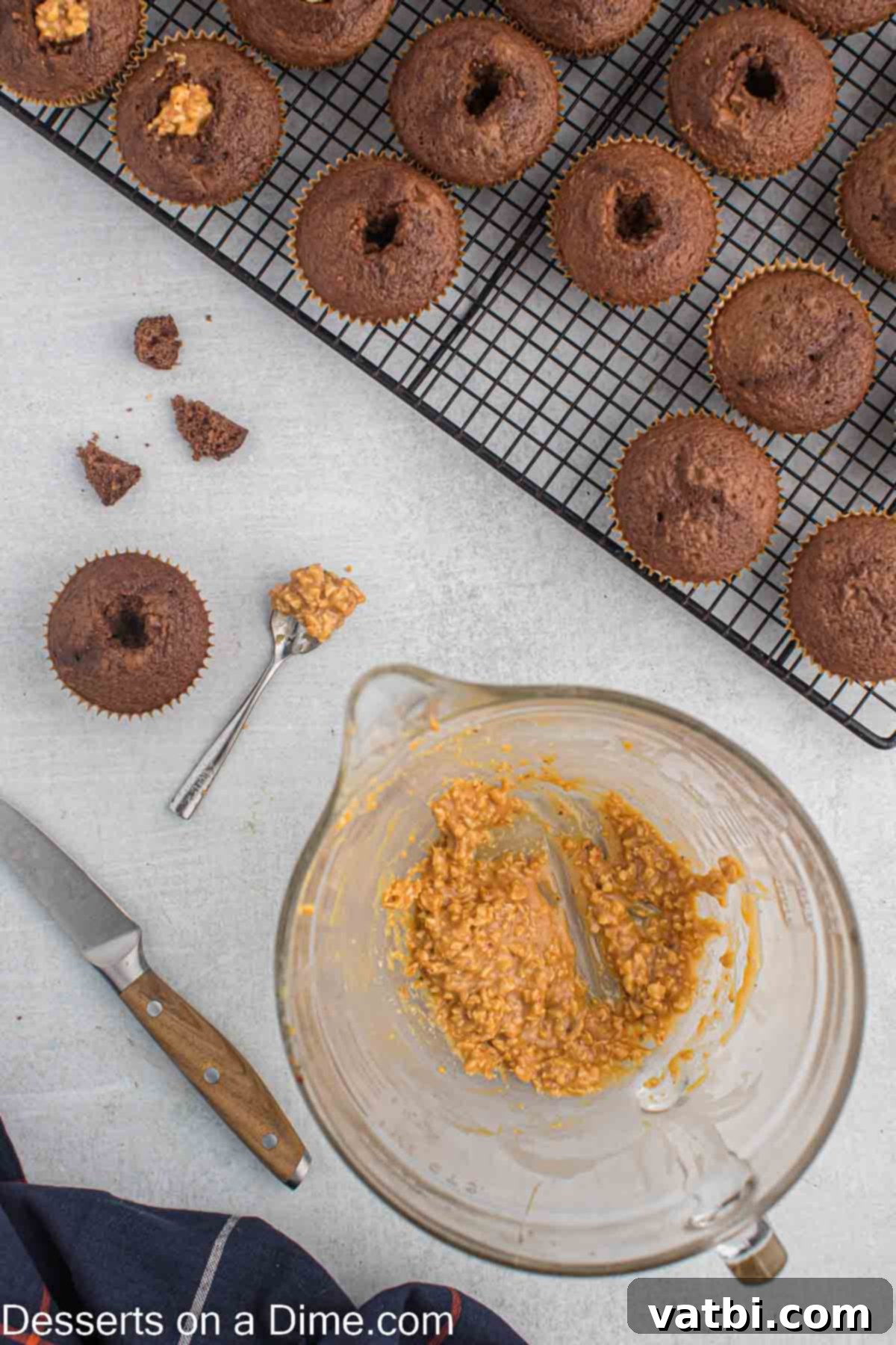 Ultimate Snickers Cupcakes 6 Chopped peanuts added to bowl.