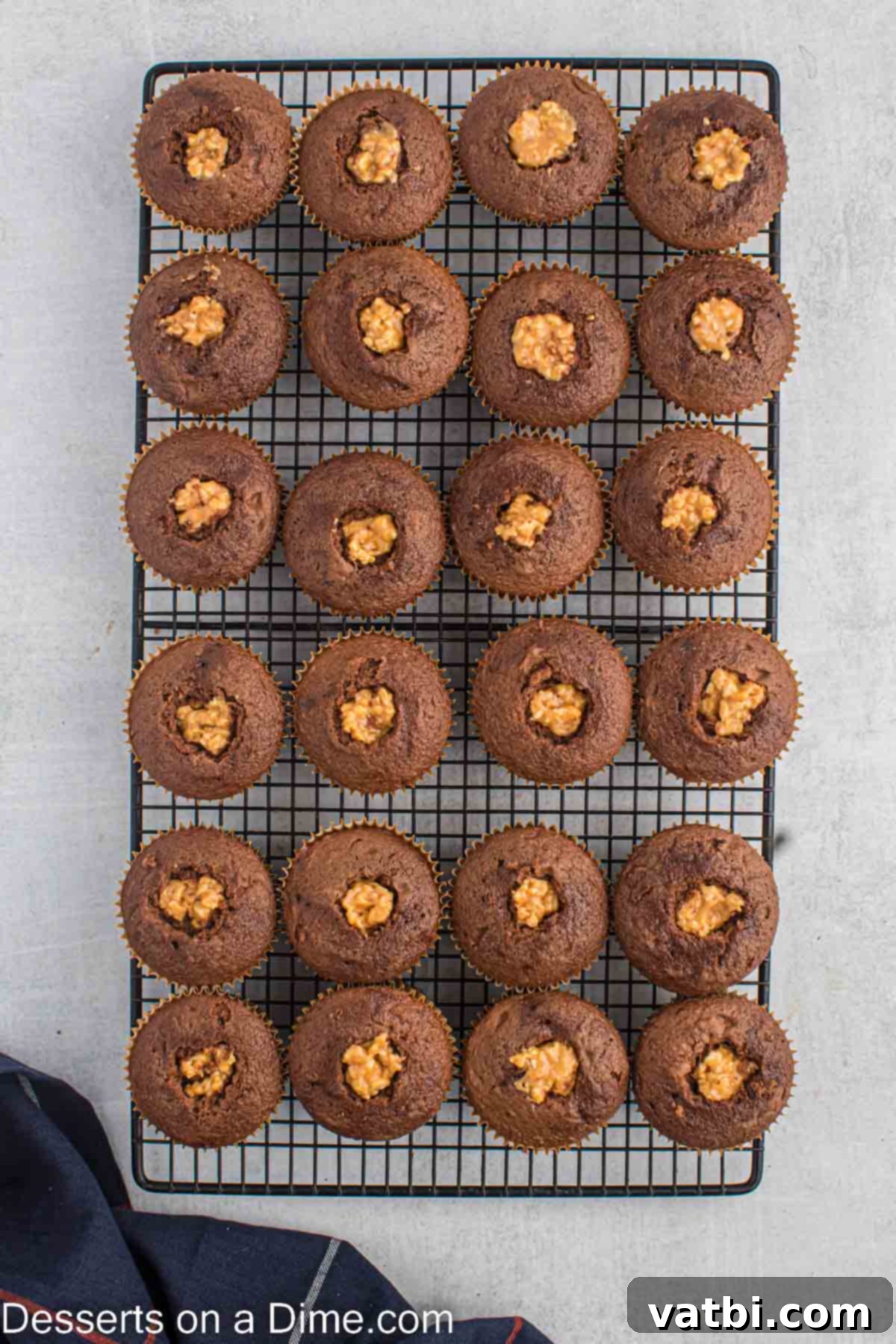 Ultimate Snickers Cupcakes 7 Filling added to each cupcake.