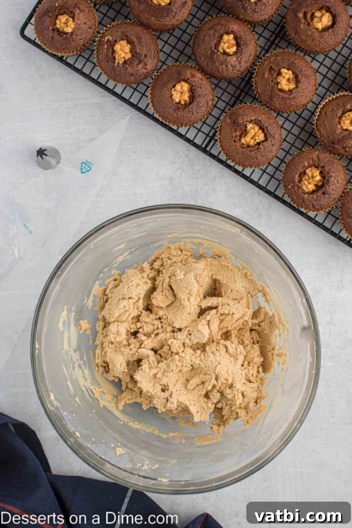 Ultimate Snickers Cupcakes 9 Powdered sugar added and combined.