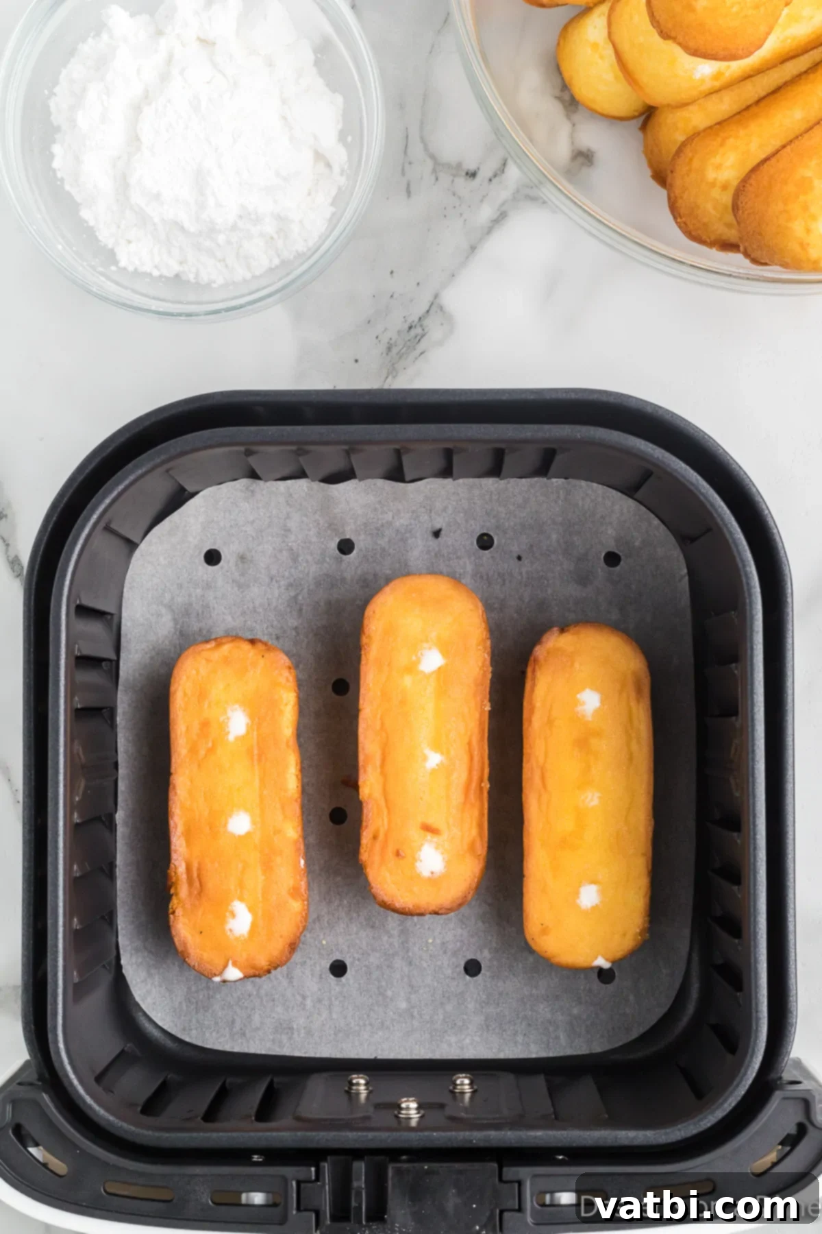 Golden Air Fried Twinkies 6 Twinkies turned and cooked.