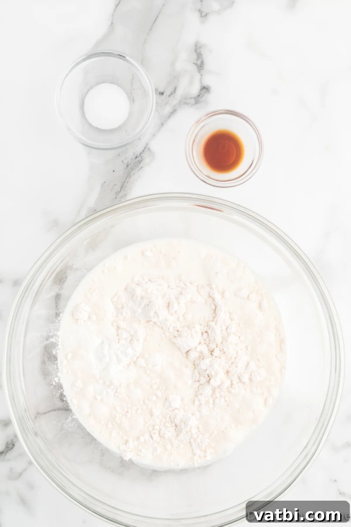 Sweet & Simple Blackberry Cobbler 5 Dry ingredients for the cobbler topping (flour, baking powder, salt) combined in a bowl.
