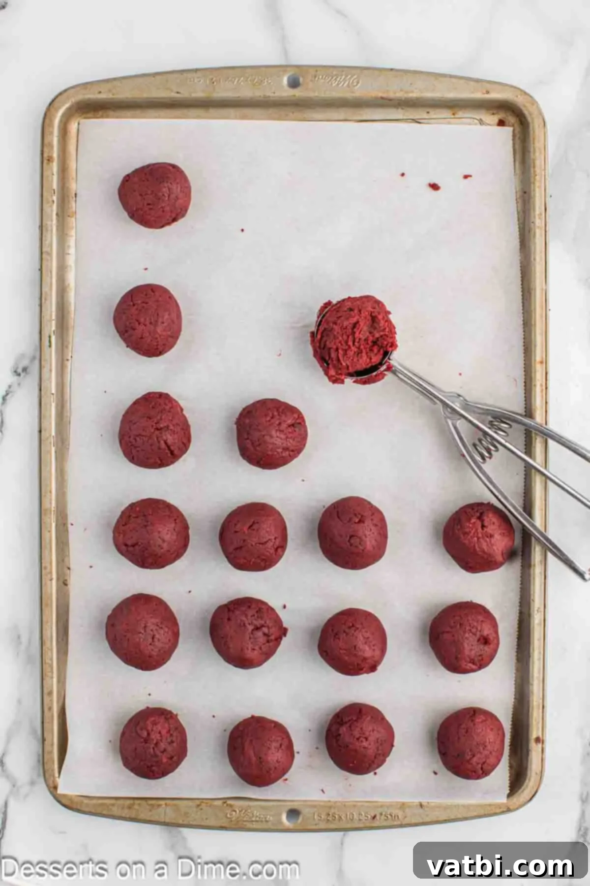 Whoville Grinch Cake Pops 7 Rolling the cake mixture into uniform balls.