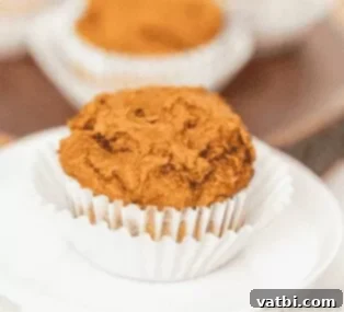 35 Thanksgiving Treats Kids Will Gobble Up 12 2-ingredient pumpkin muffins in a basket.