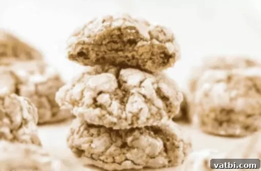 35 Thanksgiving Treats Kids Will Gobble Up 15 Pumpkin cake mix cookies on a baking sheet.