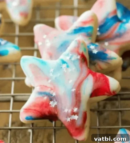 Patriotic Cookie Creations 8 Star-Spangled Cookies with red, white, and blue frosting and sprinkles