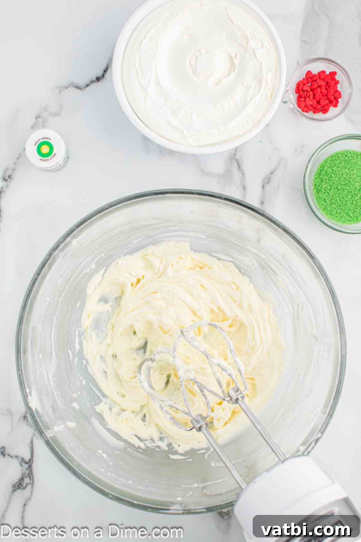 The Grinch's Heart-Melting Holiday Pie 6 Beating the softened cream cheese and powdered sugar together in a mixing bowl