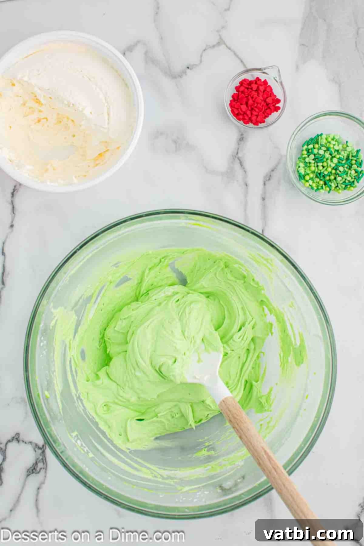 The Grinch's Heart-Melting Holiday Pie 8 Gently mixing the cool whip into the green pie filling mixture