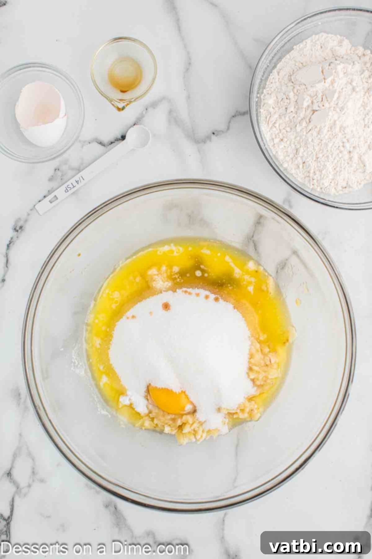 Moist Air Fryer Banana Bread 4 Mixing bowl with eggs, bananas and butter.