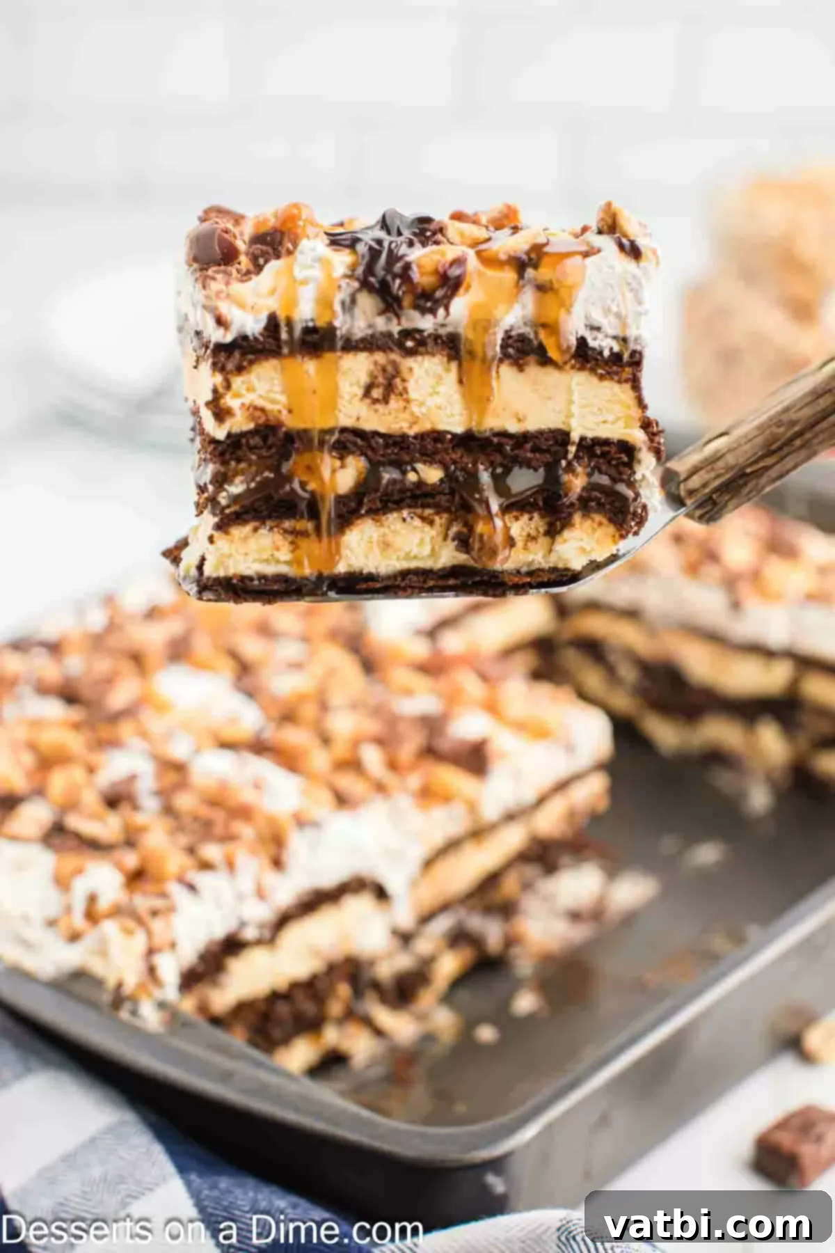 Decadent Snickers Ice Cream Cake 2 Ice cream cake being served.