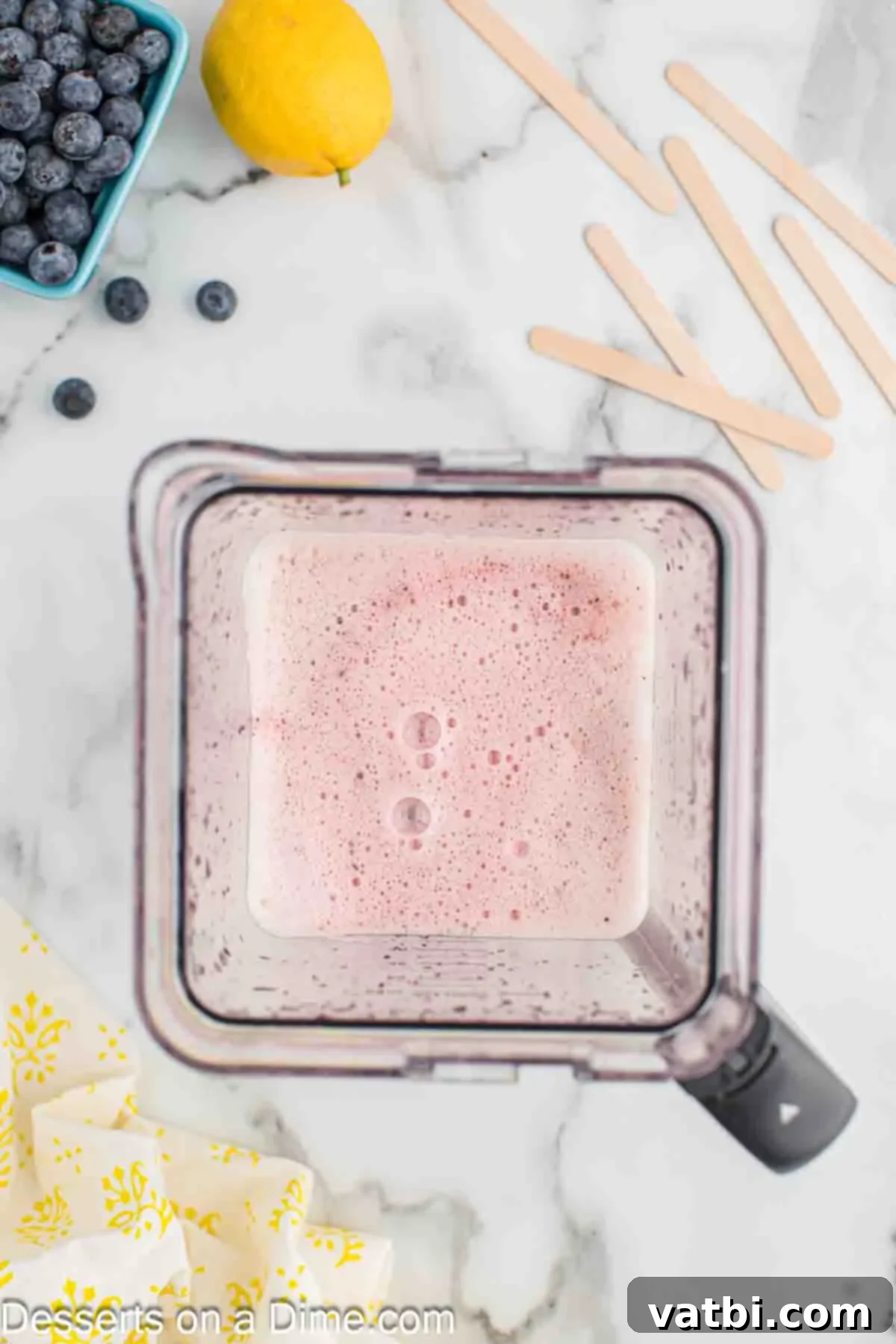 Frosted Lemon-Berry Bliss 6 Blender with mixture inside.