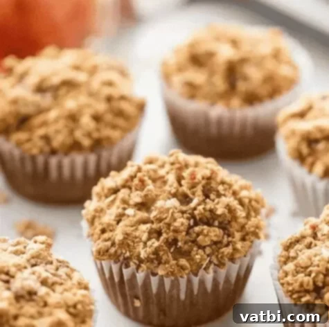 37 Must-Try Brunch Desserts 26 Oatmeal Applesauce Muffins on a plate.