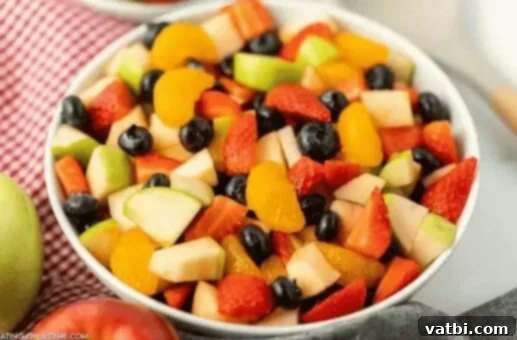37 Must-Try Brunch Desserts 32 Copycat Chick-fil-A fruit cup in a clear container.