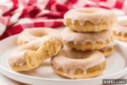 37 Must-Try Brunch Desserts 33 Homemade Glazed Donuts on a wire rack.