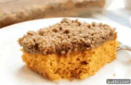 37 Must-Try Brunch Desserts 4 Pumpkin coffee cake with streusel topping and a dusting of powdered sugar.