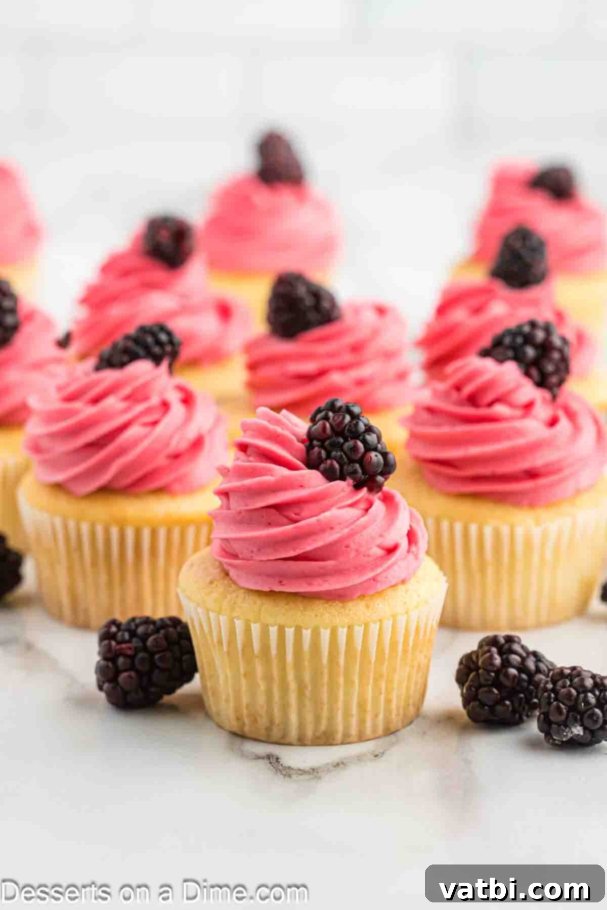 Luscious Blackberry Buttercream Frosting 9 Blackberry Buttercream Frosting on cupcakes.