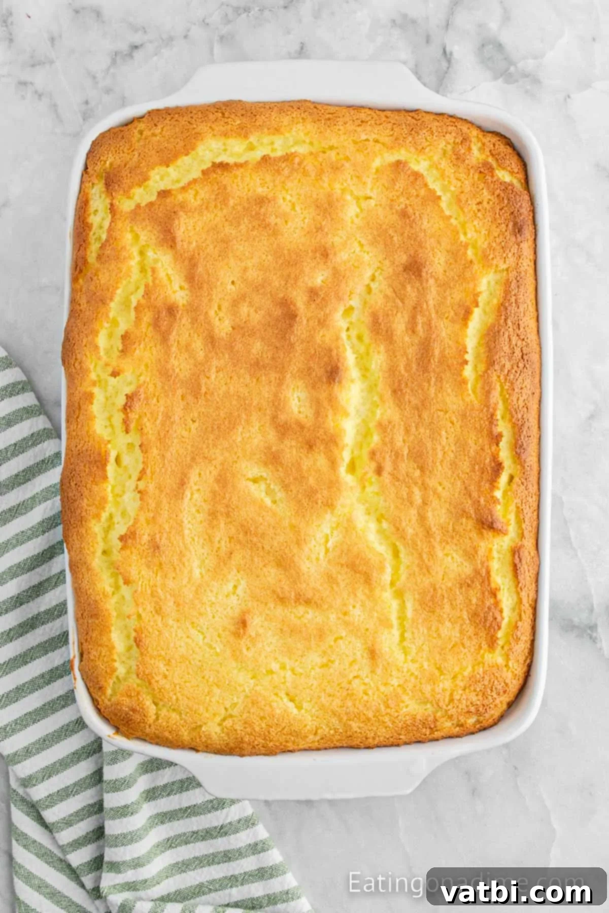 Sunshine Lemon Angel Food Cake 6 Cake baked and cooling.