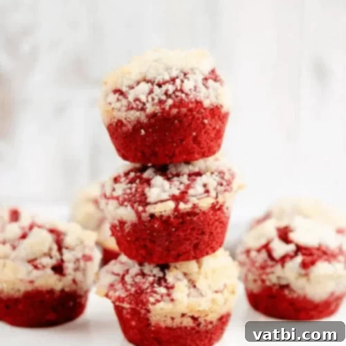 29 Decadent Red Velvet Desserts 12 Red Velvet Cream Cheese Muffins with a crumb topping.