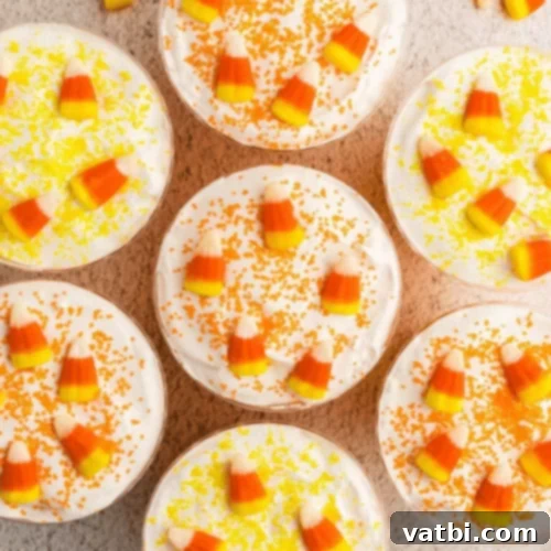 Candy Corn Pudding Cups with distinct yellow, orange, and white layers.