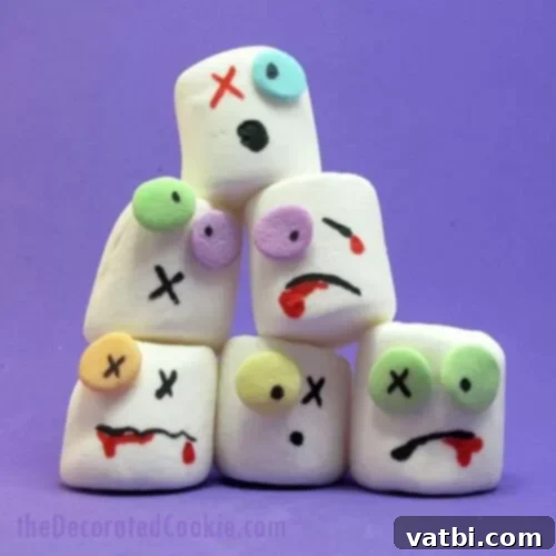 Zombie Marshmallows on sticks, decorated with edible food pens.