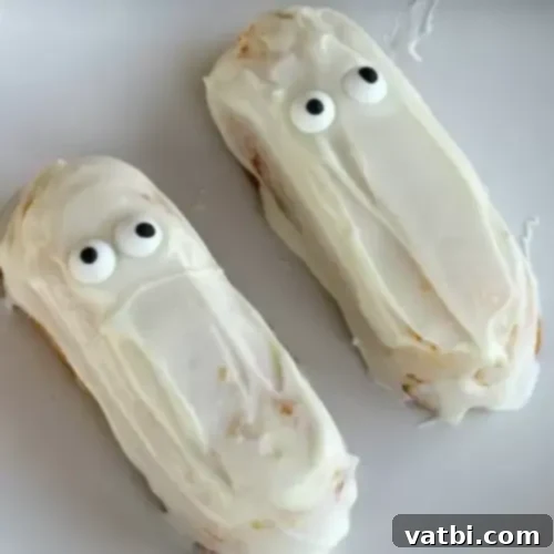 Ghost Twinkies, coated in white and decorated with candy eyes.