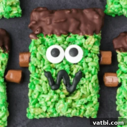 Frankenstein Rice Krispies Treats, green with chocolate and candy eyes.