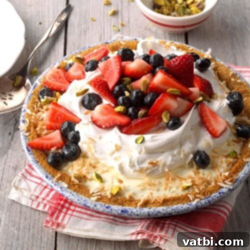 Berry Pistachio Pie, a flavorful no-bake dessert with graham cracker crust, pistachios, and fresh berries.