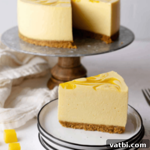 No Bake Mango Cheesecake, a perfect summer dessert with smooth and creamy mango and white chocolate flavors.