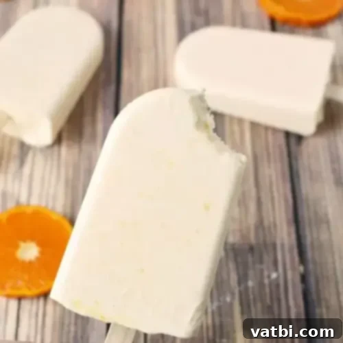Homemade Orange Creamsicle Popsicle, a refreshing and creamy no-bake frozen treat.