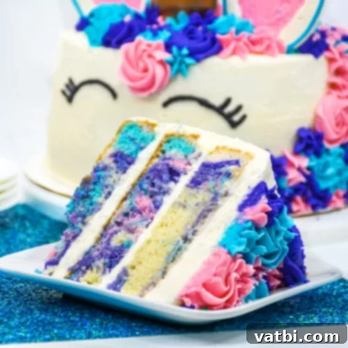 37 Magical Unicorn Desserts 8 Magical Unicorn Cake with three layers of tie-dye cake and creamy frosting.
