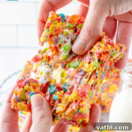 37 Magical Unicorn Desserts 26 Fruity Pebbles Treats, colorful and chewy with marshmallow coating and whole marshmallows.