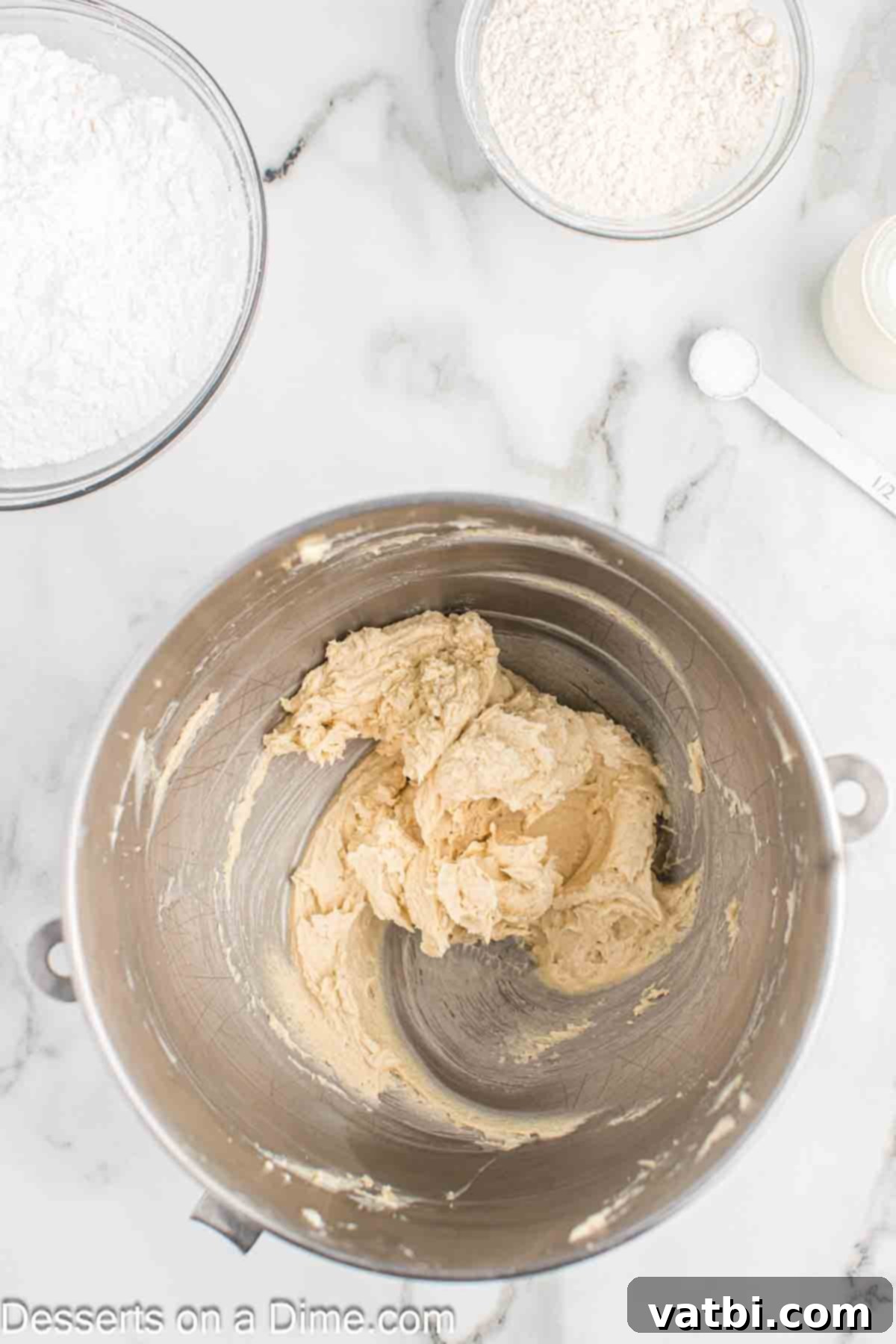 Irresistible Cookie Dough Frosting 4 Mixing bowl with sugar and butter.