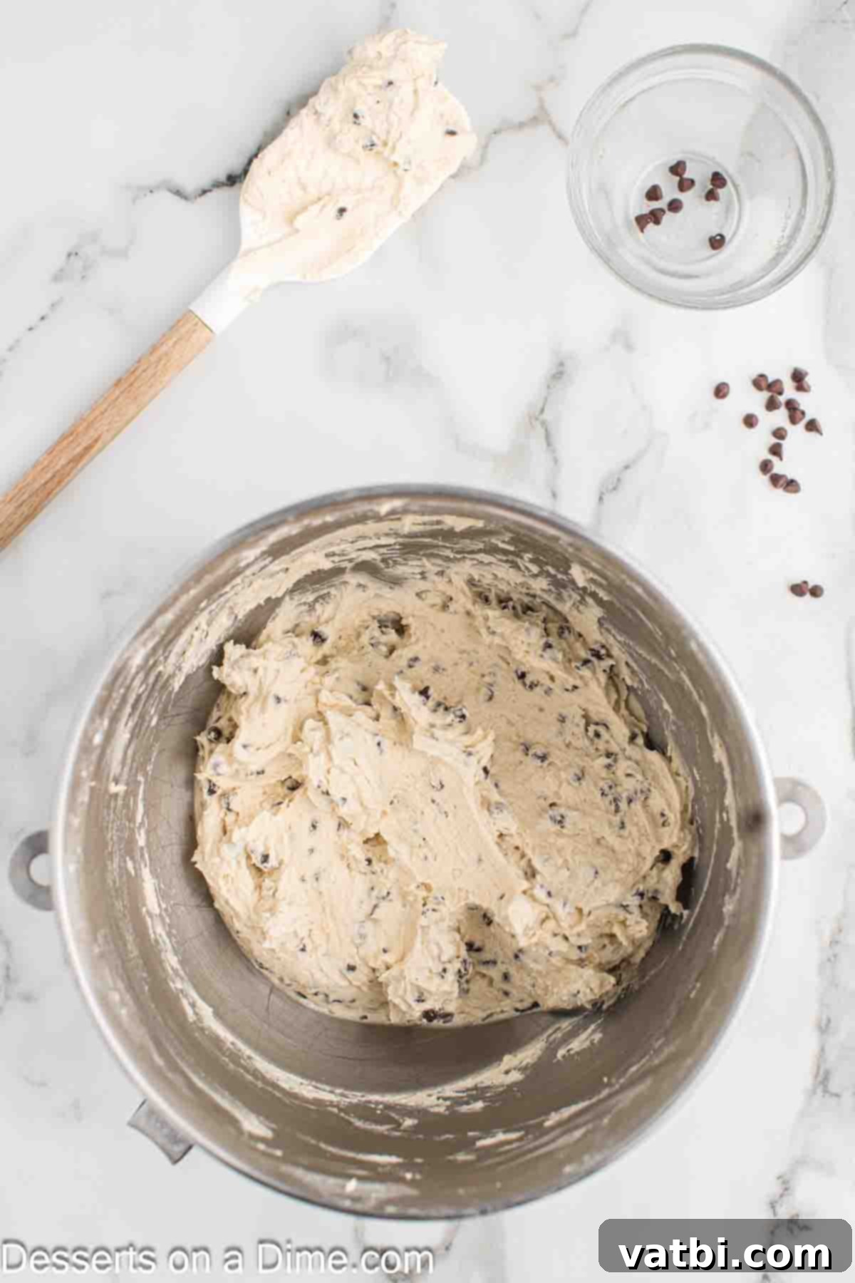 Irresistible Cookie Dough Frosting 7 Chocolate Chips folded into mixture.