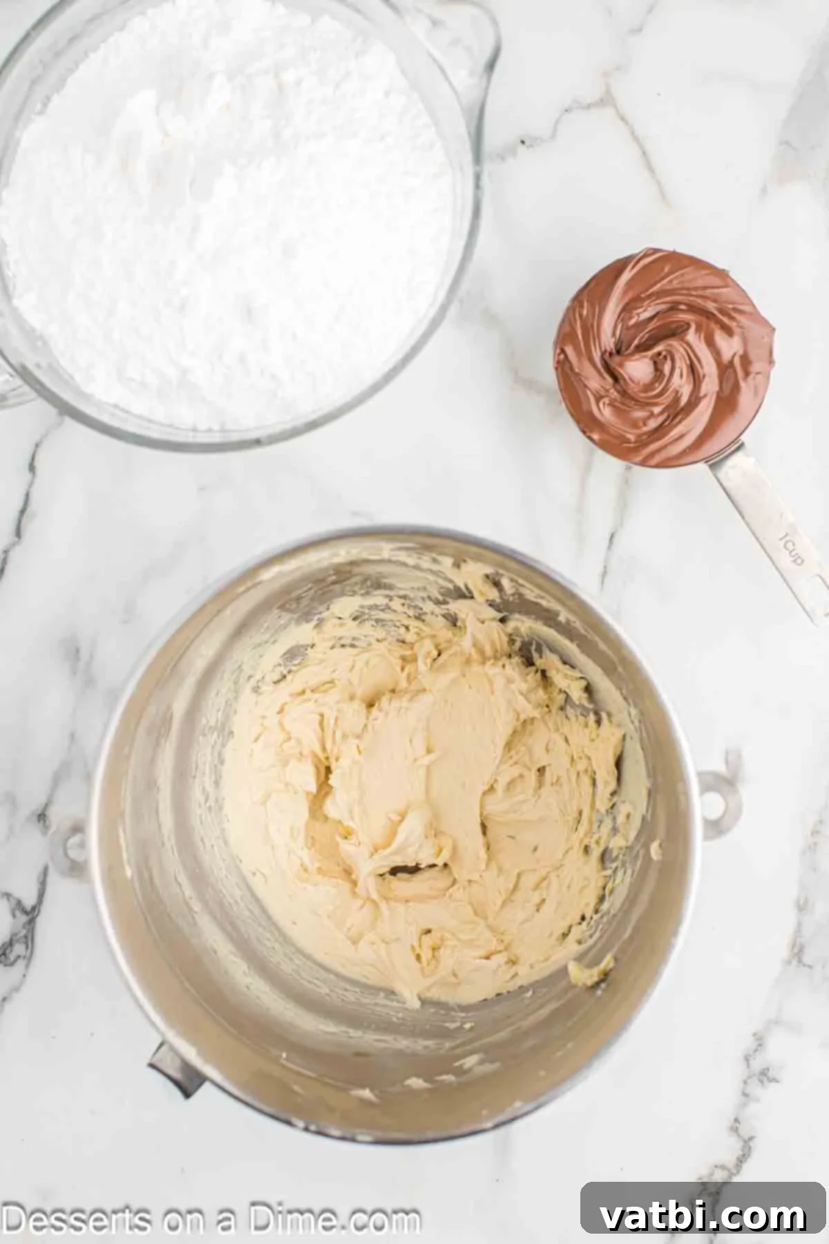 Nutella Dream Cupcakes 6 Butter and vanilla in mixing bowl.