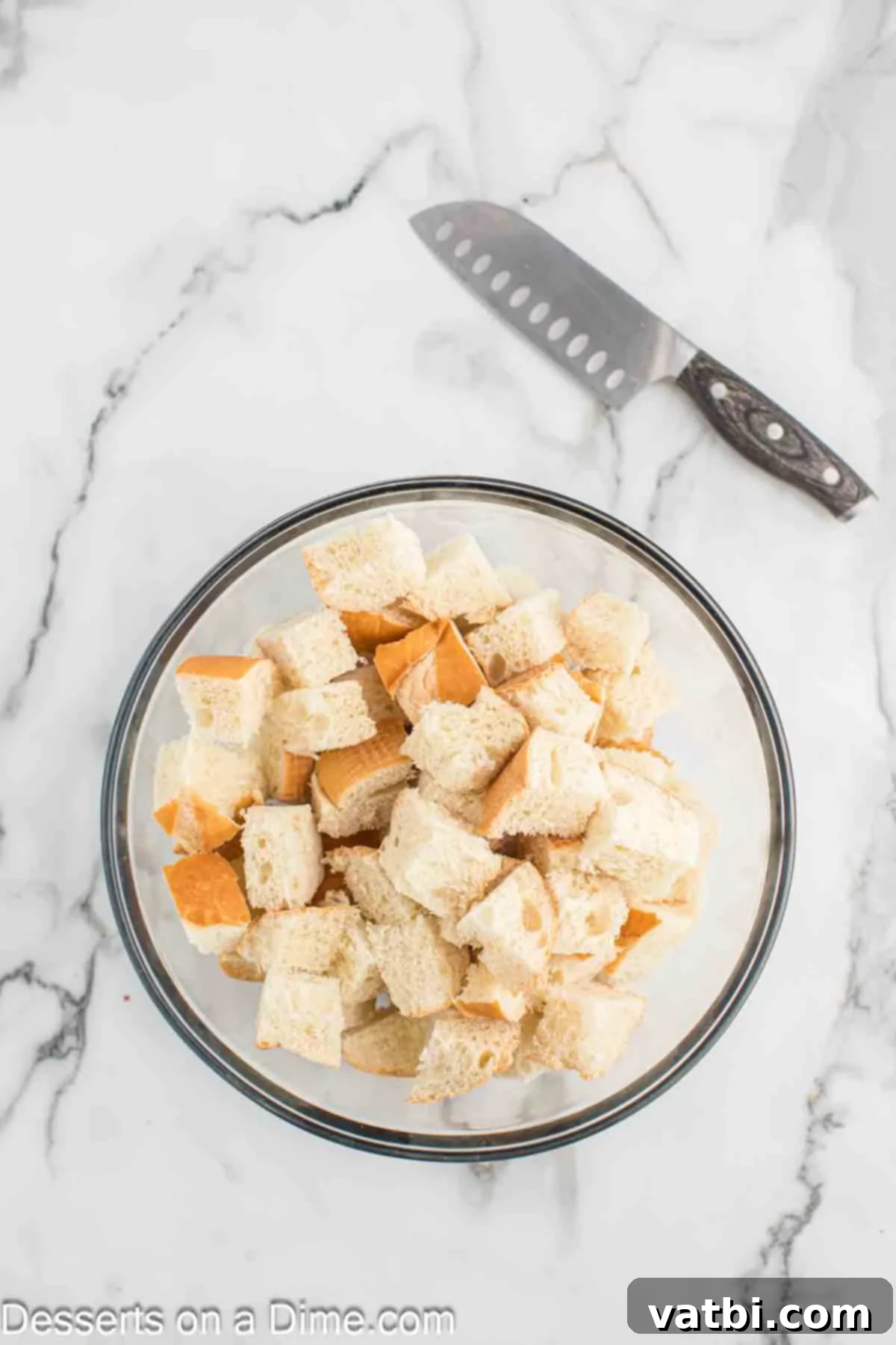 Decadent Pumpkin Bread Pudding 7 Crusty French bread cut into 1-inch cubes and placed in a large bowl.