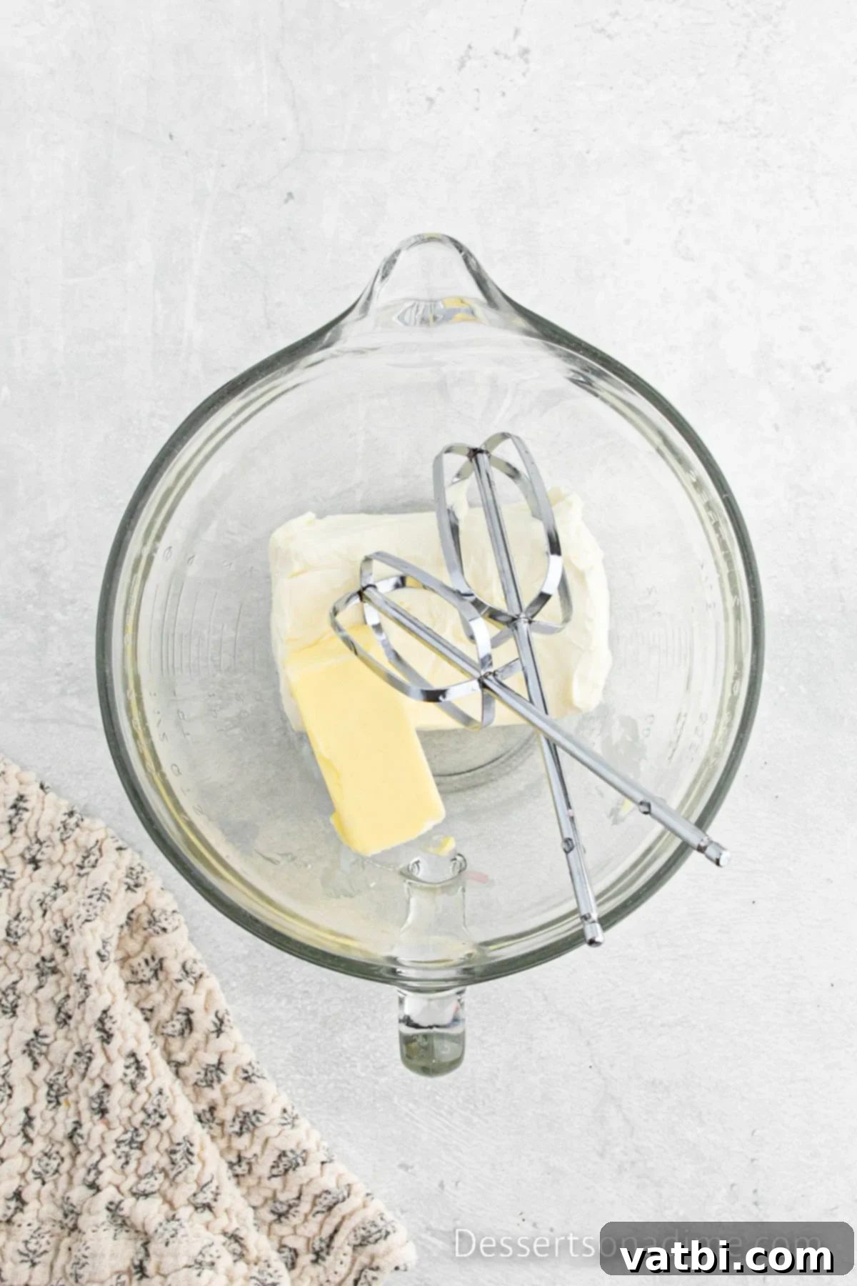Mixing bowl with butter and cream cheese. 
