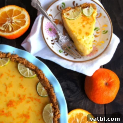 67 Zesty Lime Desserts 4 Orange Key Lime Pie with a cardamom crust and Seville oranges, offering a unique tangy and sweet flavor balance.