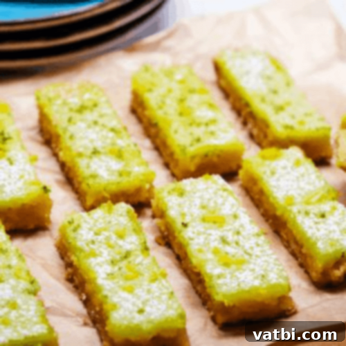 67 Zesty Lime Desserts 10 Gluten-Free Lemon Lime Bars, a tart and refreshing treat perfect for sharing, where you won't even know they are gluten-free!