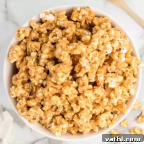 45 Festive Gluten-Free Christmas Delights 7 Peanut Butter Popcorn, a sweet and salty gluten-free snack or dessert.