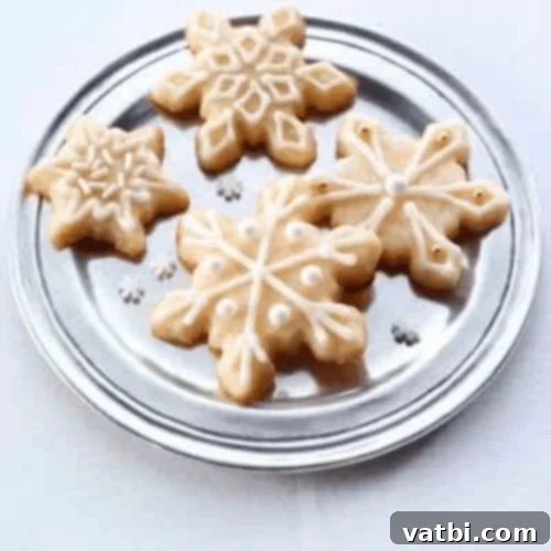 45 Festive Gluten-Free Christmas Delights 15 Delicate Snowflake Eggnog Cookies, a beautiful gluten-free addition to Christmas desserts.