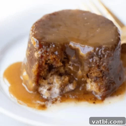 45 Festive Gluten-Free Christmas Delights 26 Gluten-Free Sticky Toffee Pudding Cake with rich toffee sauce, a decadent holiday dessert.