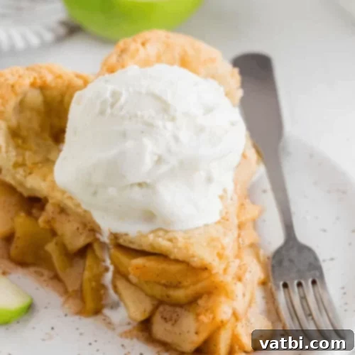 Thanksgiving Dessert Perfection: 35 Gluten-Free Pies 9 A golden-crusted gluten-free apple pie, served warm and topped with a scoop of vanilla ice cream, promising pure comfort.