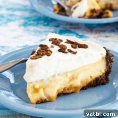 Thanksgiving Dessert Perfection: 35 Gluten-Free Pies 22 A tempting slice of No Bake Dulce de Leche Banana Cream Pie, showing its delightful layers, presented on a plate.