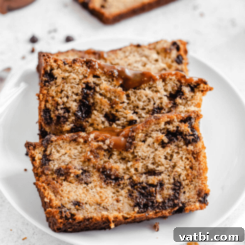 Slice of Salted Caramel Chocolate Chip Banana Bread.