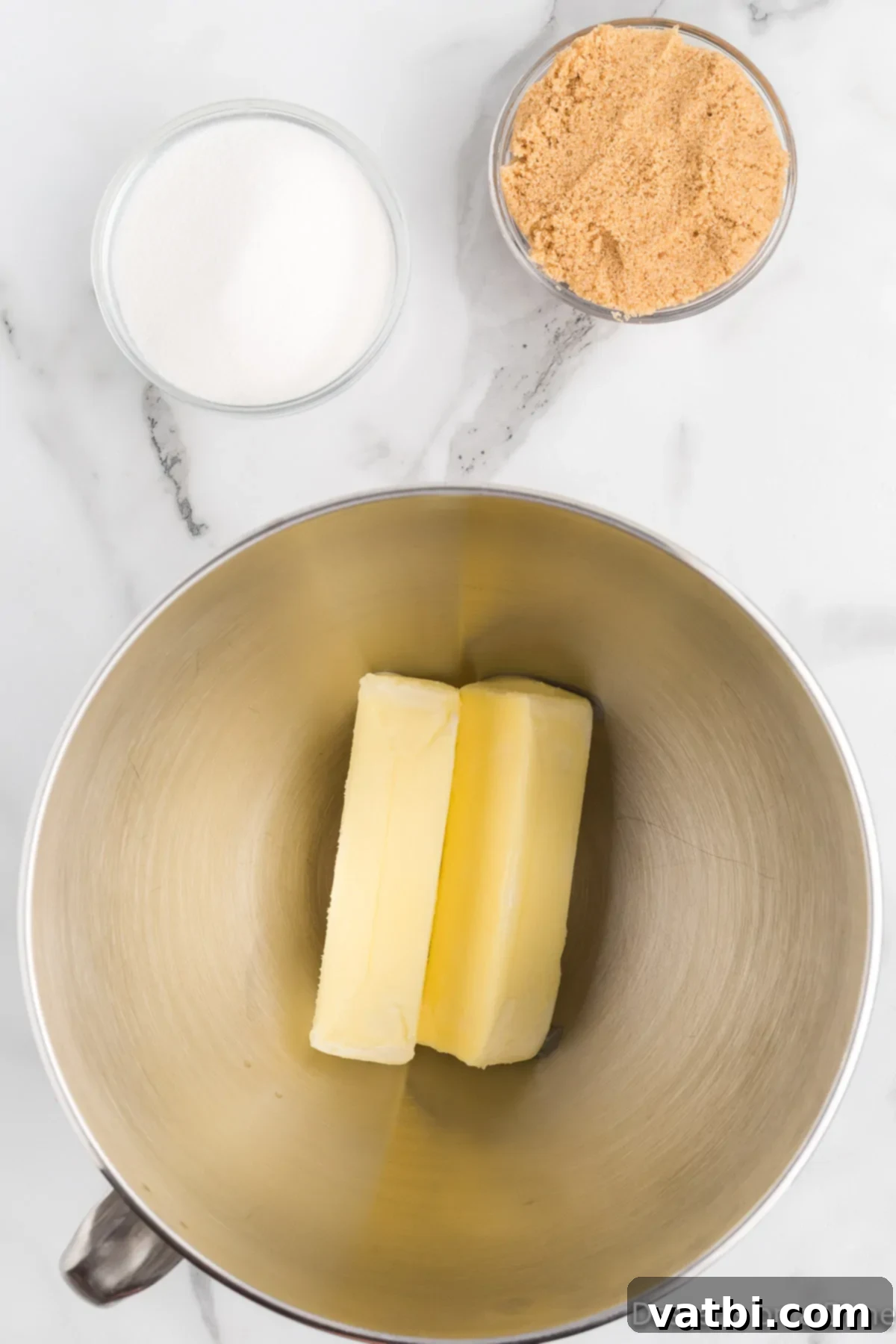 Festive Ranch Cookies 5 Beating softened unsalted butter, granulated sugar, and light brown sugar together in a stand mixer bowl until the mixture is light, fluffy, and pale in color.