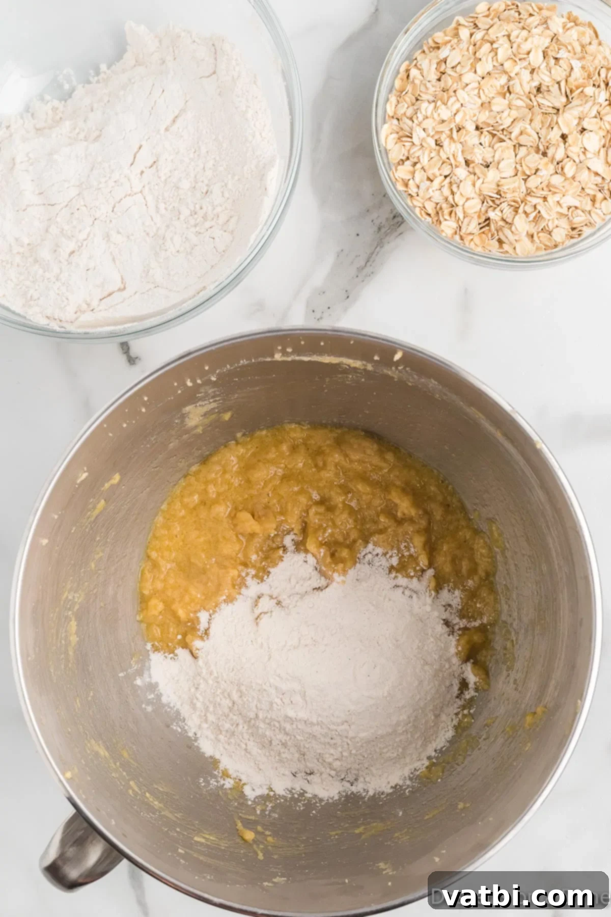Festive Ranch Cookies 7 Gradually combining the whisked dry ingredients (flour mixture) with the wet butter, sugar, egg, and vanilla mixture in a stand mixer on low speed.